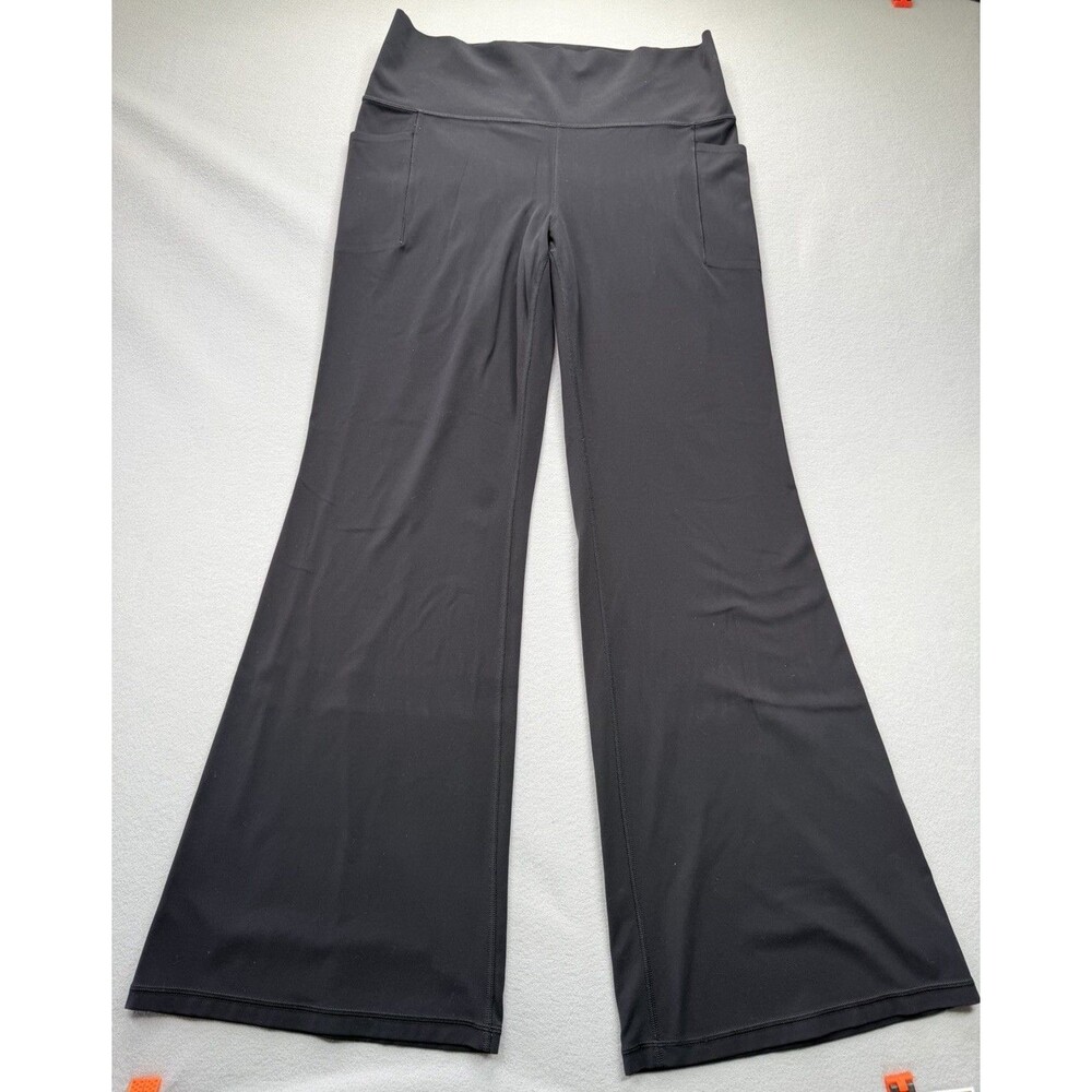 Athleta Salutation Stash Flare Pant XL Black Yoga Leggings Pockets Stretch - Picture 4 of 14
